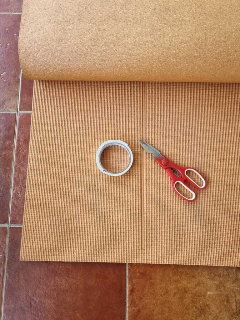 Yoga Mat, Scissors and Tape for childproofing DIY 