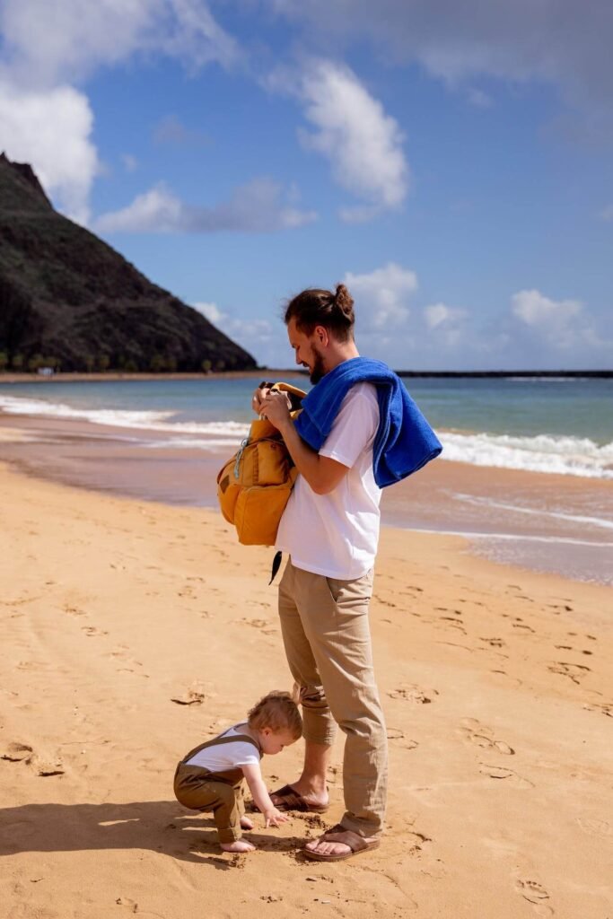 Dad and infant at the beach