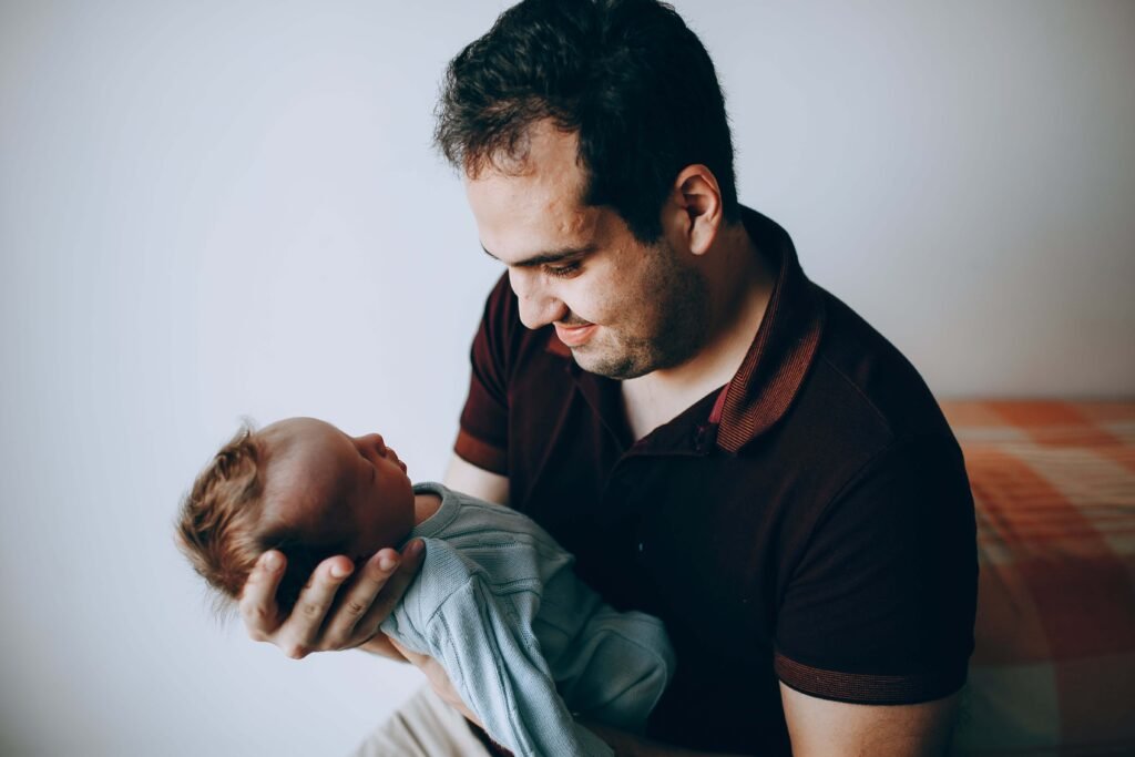 Dad Bonding with Newborn