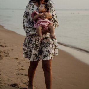 A mother and infant at the beach