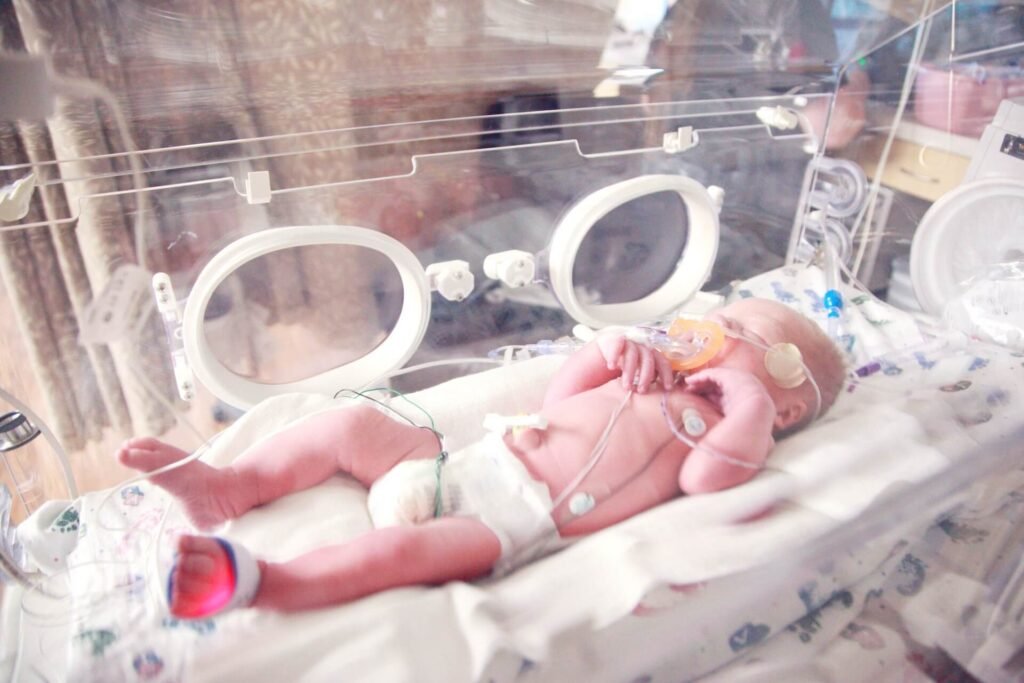 Newborn being given oxygen