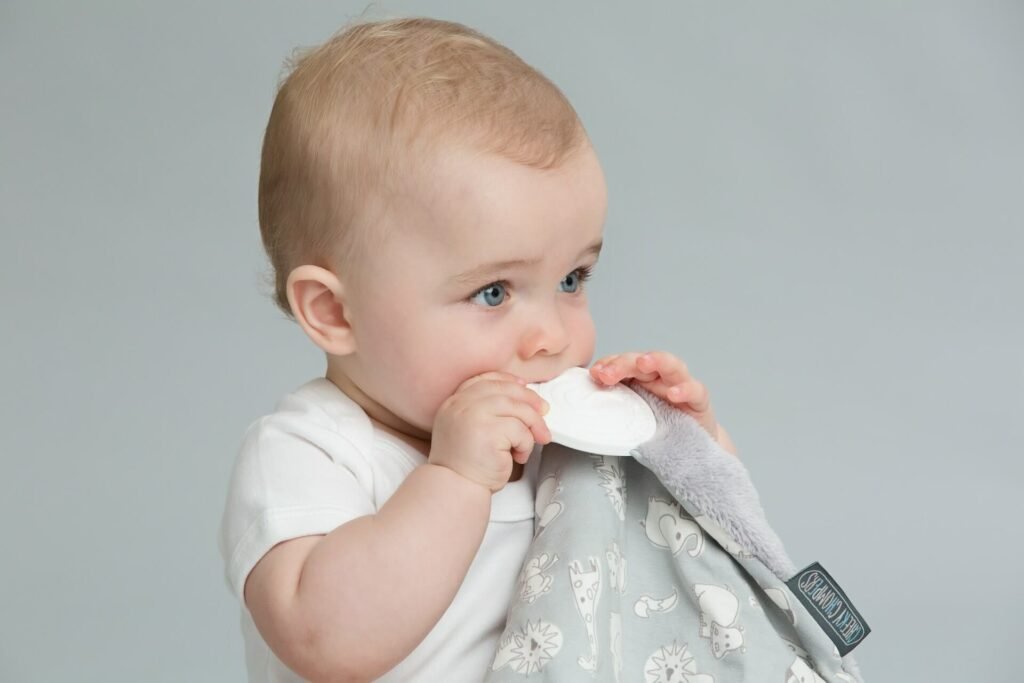 Baby teething and biting an object